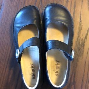 Algeria Paloma in black leather.